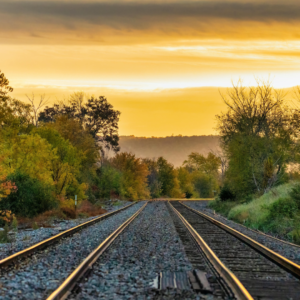 train tracks countryside Wonders of the Maritimes & Scenic Cape Breton with Ocean Train to Montreal
